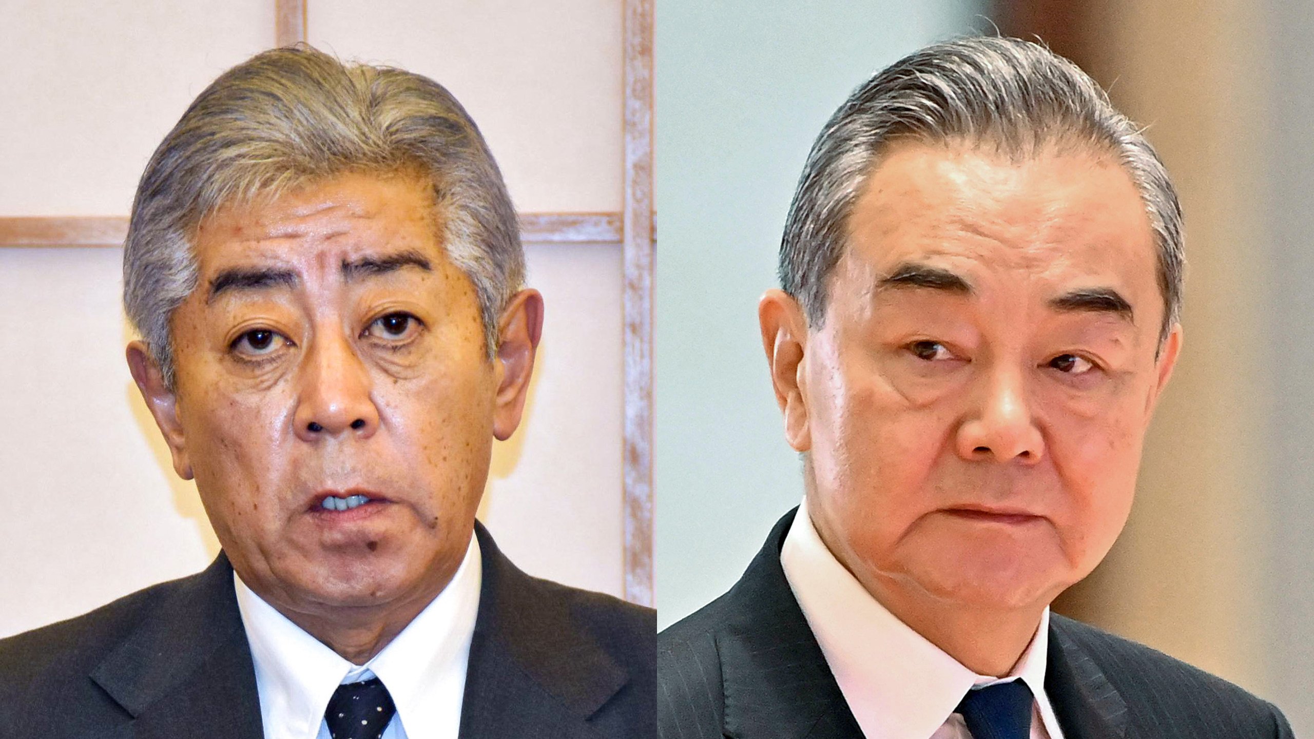 Takeshi Iwaya (left) held his first phone  call as foreign minister with Chinese counterpart Wang Yi. Photo: Kyodo, AFP